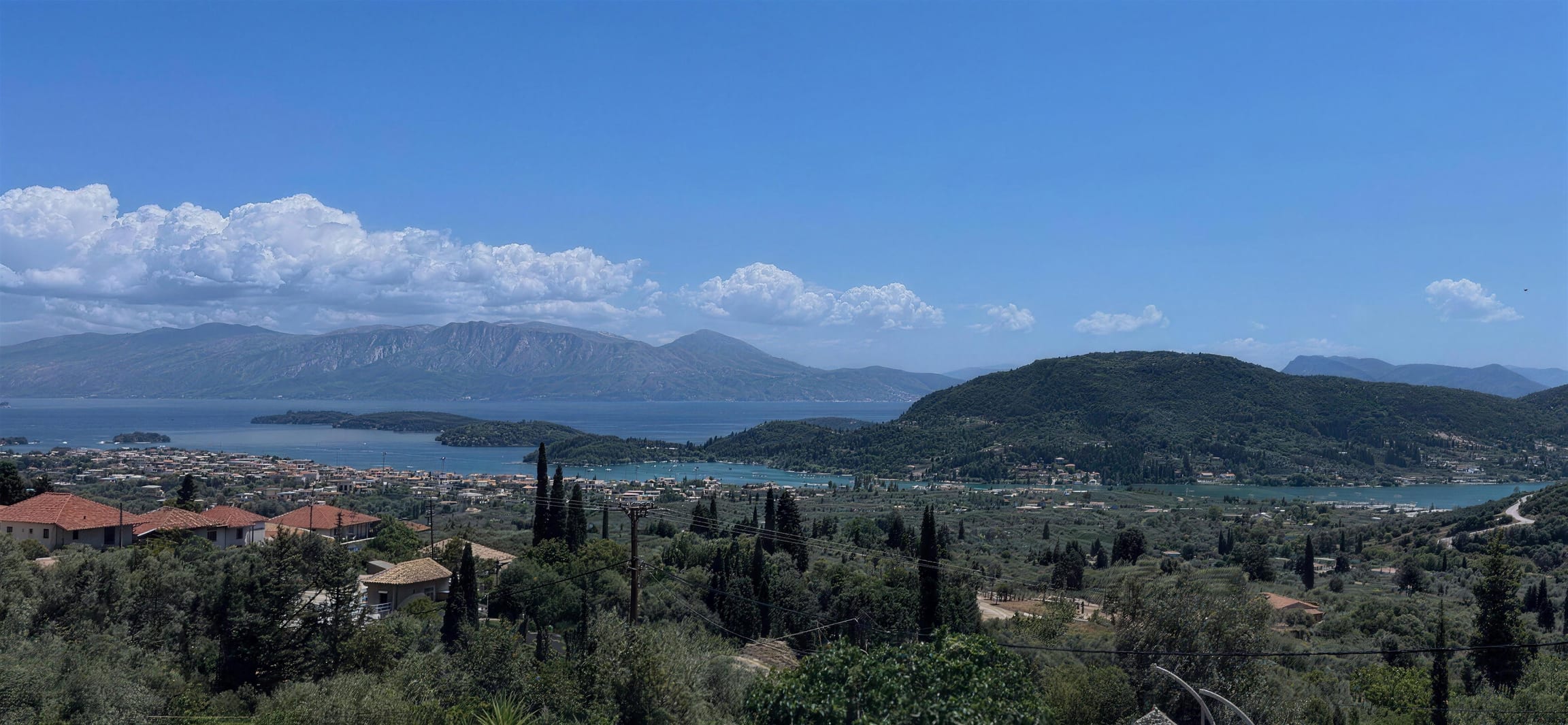 The view from the terrace over Nidri, its harbour and the islands beyond