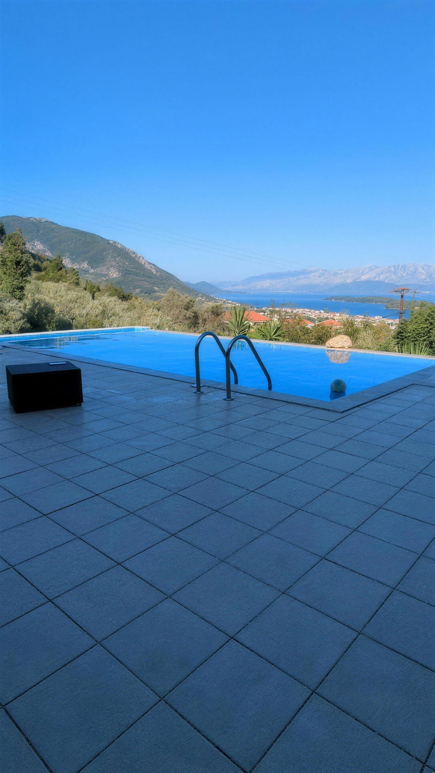 The pool on the front terrace, looking out over the bay